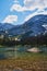 Incredibly beautiful transparent, emerald calm lake with reflection of rocky mountain on the Black Prince Cirque Trail. Majestic