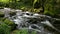 Incredibly picturesque landscape of the Black Forest mountains. Small mountain river flows through stones around stones