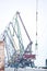 Indastrial crane in cargo port at winter ready for work