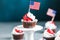 Independence Day Fourth of July USA American patriotic party with american symbols. Cupcakes dessert decorated cream cheese or