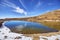 Independence Pass mountain landscape with lake and blue sky.