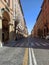 Independence street in Bologna city Italy with its ancient buildings seen in Perspective