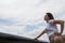 Independent woman looking at clouds