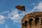 Independentist flag waving on top of medieval tower cloud