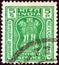 INDIA - CIRCA 1971: A stamp printed in India shows four Indian lions capital of Ashoka Pillar refugee relief issue, circa 1971.