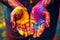 India Close up of hands covered in vibrant Holi colors, festival celebration with copy