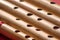 India,Diagonal Close up of the holes of hindu bamboo flute called Bansuri.