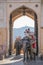 India elephant with colorful paintting with mahout on top at Amber Palace, Rajasthan, India