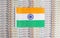 India flag on a background from dollar banknotes. Concept of the relationship of the Indian money in relation to the dollar, the