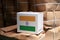 India flag on white box with barcode and the color of nation flag on the stack of brown box. The concept of export trading from