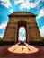 The India Gate is located in the center of New Delhi. The capital of India. Background blue sky clouds