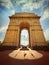 The India Gate is located in the center of New Delhi. The capital of India. Background blue sky clouds