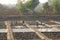 India, GOA, January 19, 2018. Men work in the field, dig or plow the earth with shovels. Heavy manual labor in India. Rice fields