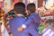 India, GOA, January 28, 2018. A son in the hands of his father, holds Indian rupees in his hand