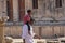 India, Hampi, 01 February 2018. A small Indian boy sits on the shoulders of the pope. Dad and son. Inside the Temple of Virupaksha