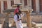 India, Hampi, 01 February 2018. A small Indian boy sits on the shoulders of the pope. Dad and son. Inside the Temple of Virupaksha