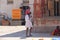 India, Hampi, 01 February 2018. A small Indian boy sits on the shoulders of the pope. Dad and son. Inside the Temple of Virupaksha