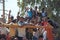 India, Hampi, 02 February 2018. A beautiful Indian truck carries a lot of Indian people. The merry Hindus smile and wave their