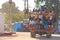 India, Hampi, 02 February 2018. A beautiful Indian truck carries a lot of Indian people. The merry Hindus smile and wave their