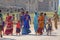 India, Hampi, 02 February 2018. The main street of Hampi village is women in bright and colorful saris, men, children, a group of