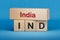 India and IND symbol. Concept words India and IND on wooden blocks.