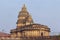 INDIA, KARNATAKA, SRINGERI, February 2022, Devotee at .Vidyashankara Temple, Temple has a richly sculpted plinth, six doorways and