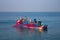 India, Kerala - December 27, 2015: Indian fishermen graphically pull painted Seine right in boat 2. Net painted in bright colors,