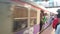 India Mumbai Local Suburban Railway Train on Move Crowded with People on Station