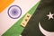 India Pakistan flags with jammu and kashmir written in scrabble letters on the flag
