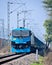India\\\'s most powerful locomotive , with high rise pantograph, hauling heavy goods train