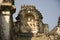 Indian architecture with figures of Lord Shiva and wife Parvati. Reliefs of historical temple in India