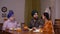 Indian army officer talking to his father and wife at the breakfast table - Serious discussion in Sikh family