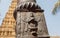 Indian art with Garuda bird on column of traditional Hindu temple. Ancient relief of old religious structure in India