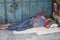 Indian beggar sleeps on the street in Johor Bahru