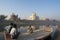 Indian boatmans watch the spectacular Taj Mahal