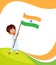 Indian boy hoisting flag of India