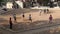 Indian boys playing cricket at the playground in Mumbai.