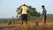 Indian boys playing cricket at the playing field in Goa.