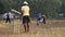 Indian boys playing cricket at the playing field in Goa.