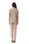 Indian business woman in beige pant suit full body protrait in high heels