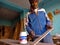 an indian carpenter applying wooden fixing liquid on plywood during work in India January 2020