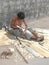 Indian carpenter making cricket bats