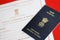 Indian Certificate of registration of marriage blank document and indian passport on table