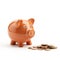 Indian clay piggy bank with human hand finger dropping coin on white background