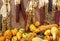 Indian corn and seasonal gourds burlap background