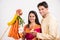 Indian Couple performing or celebrating Gudi Padwa Puja