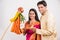 Indian Couple performing or celebrating Gudi Padwa Puja