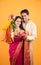 Indian Couple performing or celebrating Gudi Padwa Puja