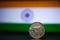 Indian currency - Indian twenty Paisa coin rupee isolated on india flag background. old 25 paisa coin 1979 with space for copy