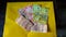 Indian Currency Rupee Notes. Background Yellow.